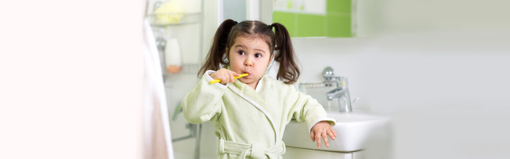 After knowing the Importance of tooth baby doing tooth Brush at Bolton dental clinic