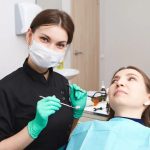 dentist using digital tools during a comfortable dental exam