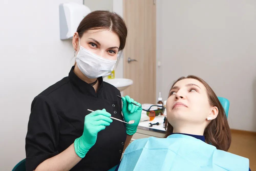 dentist using digital tools during a comfortable dental exam
